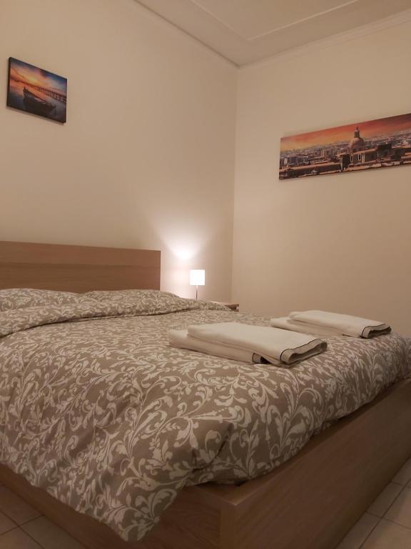 Łóżko lub łóżka w pokoju w obiekcie COCO Apartments