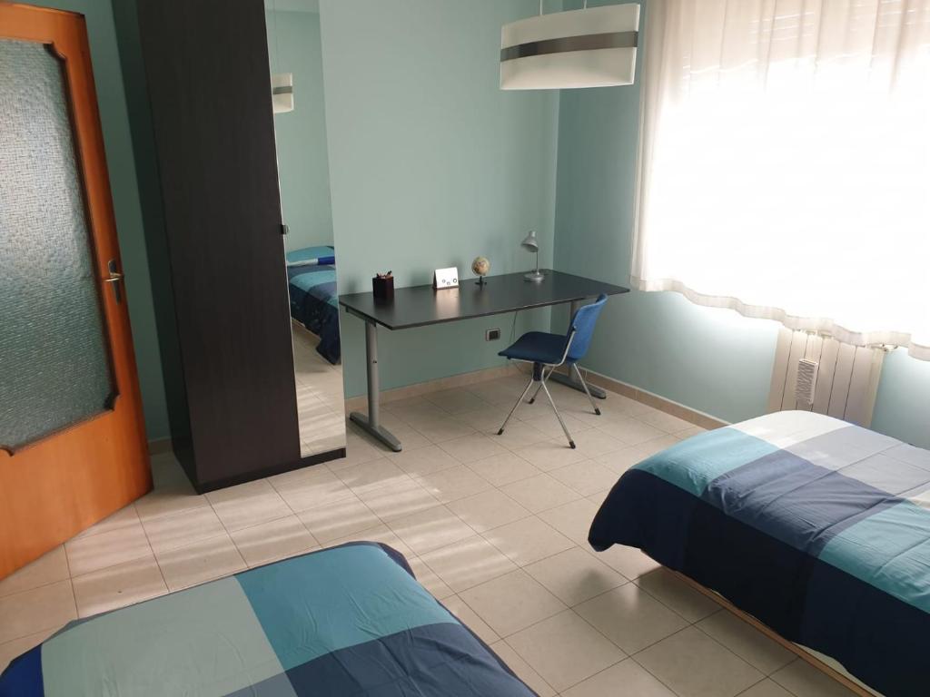 Łóżko lub łóżka w pokoju w obiekcie COCO Apartments