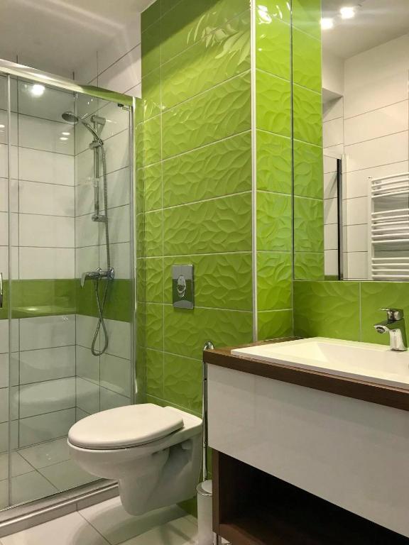 Kúpeľňa v ubytovaní Rubin Eszter Apartman Sárvár