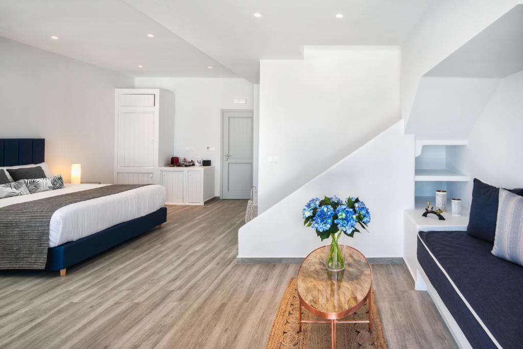 Łóżko lub łóżka w pokoju w obiekcie Siete Mares Luxury Suites