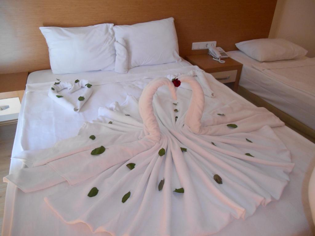 Postel nebo postele na pokoji v ubytování Hotel Kovarna
