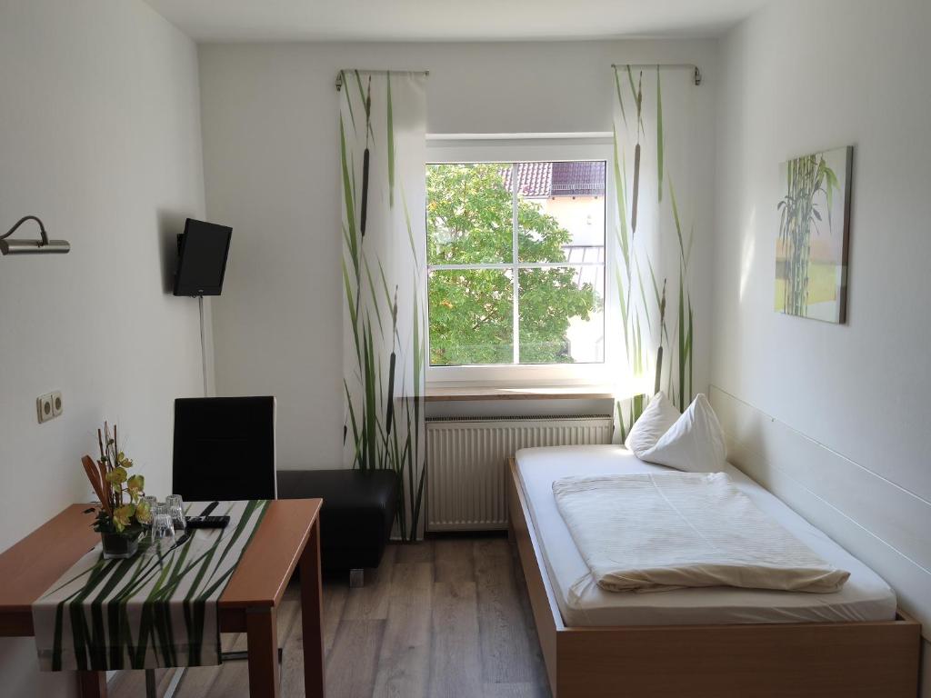 Postel nebo postele na pokoji v ubytování Landgasthof Braun