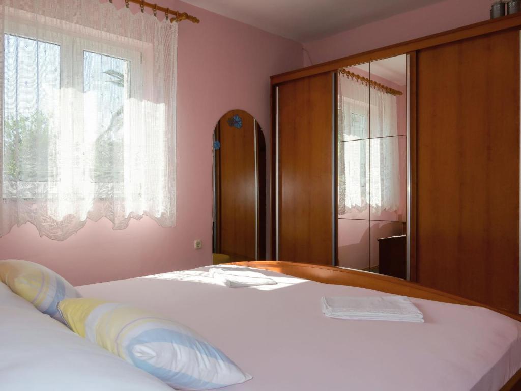 Postel nebo postele na pokoji v ubytování Apartment Hoba by Interhome