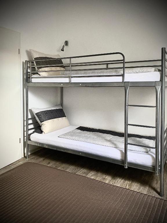 Postel nebo postele na pokoji v ubytování Dilger Apartments