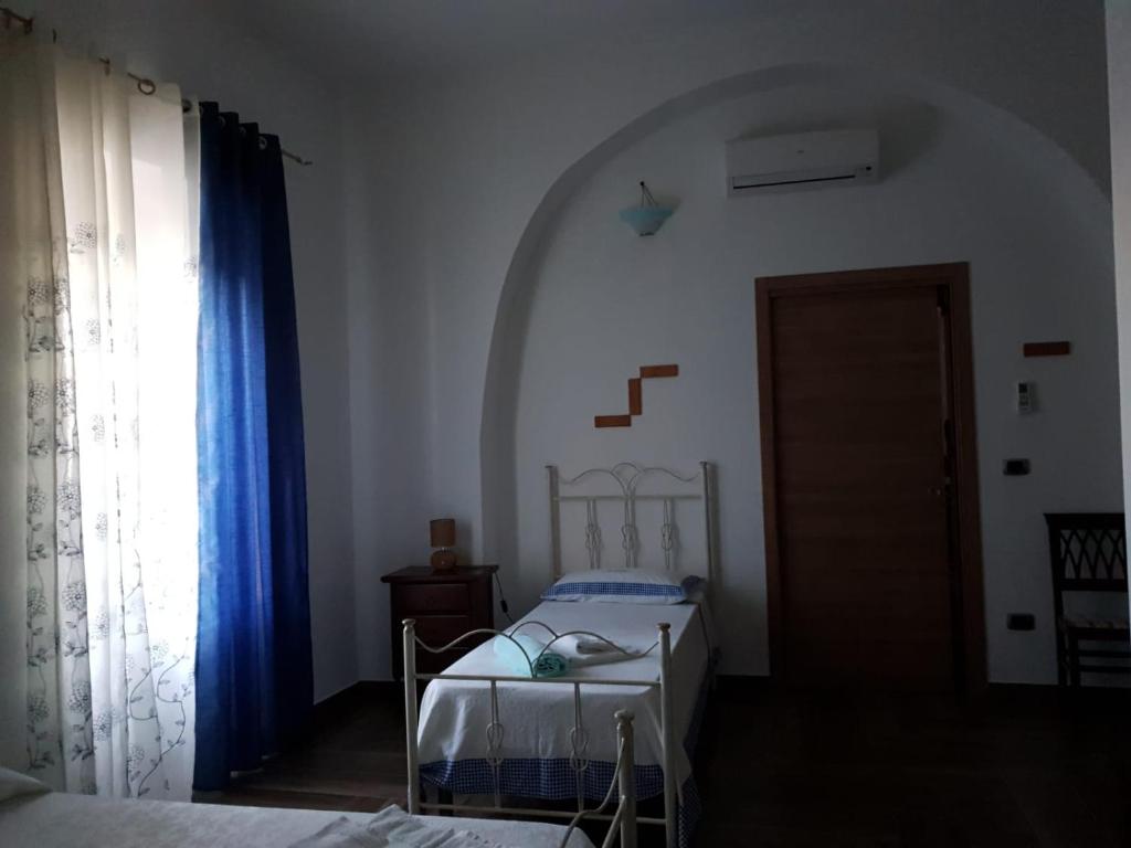 Postel nebo postele na pokoji v ubytování IL PRINCIPE