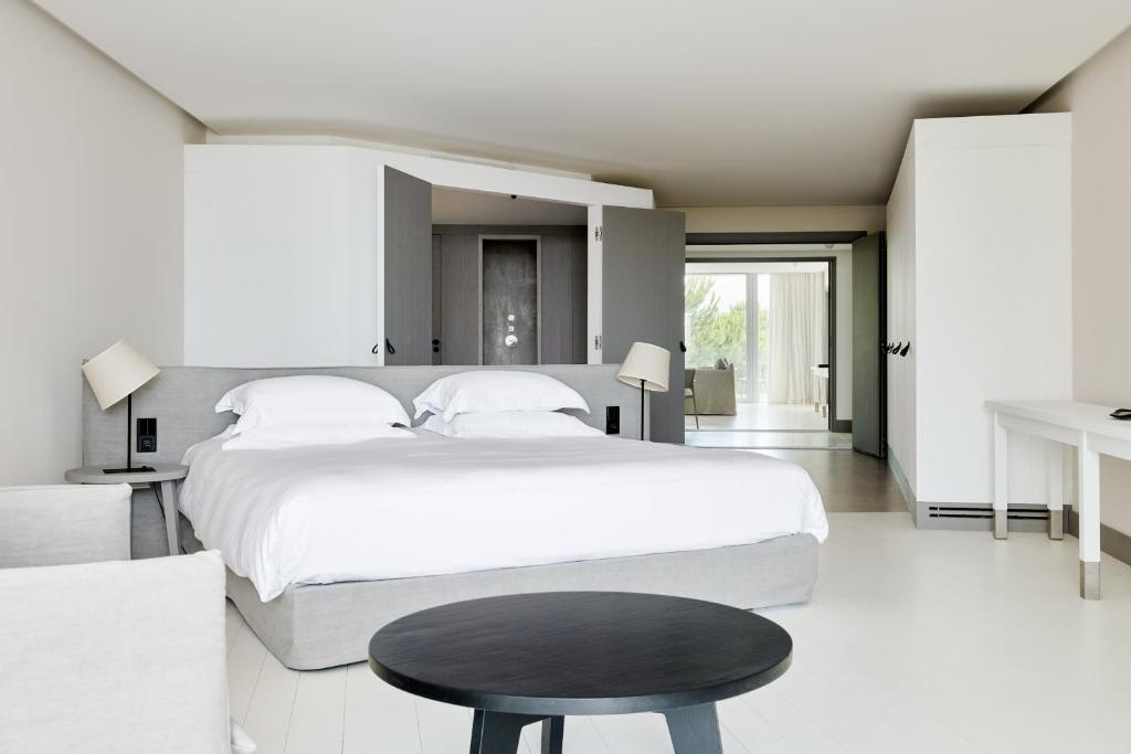 Postel nebo postele na pokoji v ubytování Hôtel Plage Palace & Spa