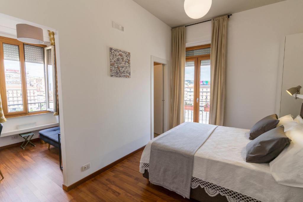 A bed or beds in a room at Florestine Napoli