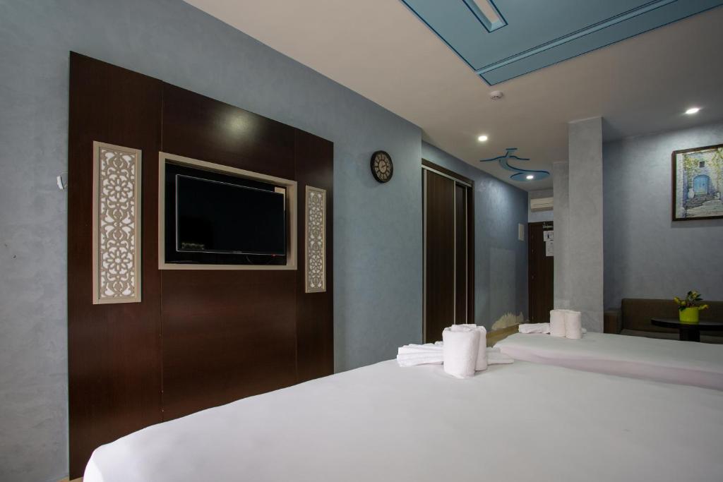 Voodi või voodid majutusasutuse Hotel Jibal Chaouen toas