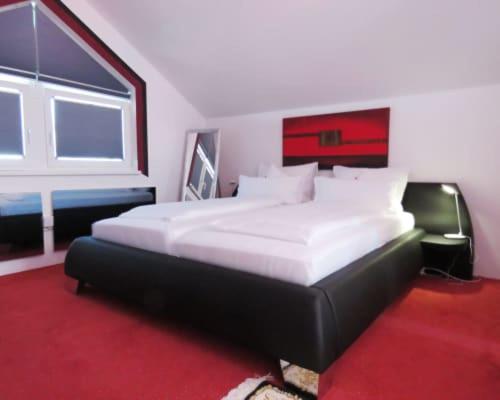Postel nebo postele na pokoji v ubytování Hotel Residenz Hössinger