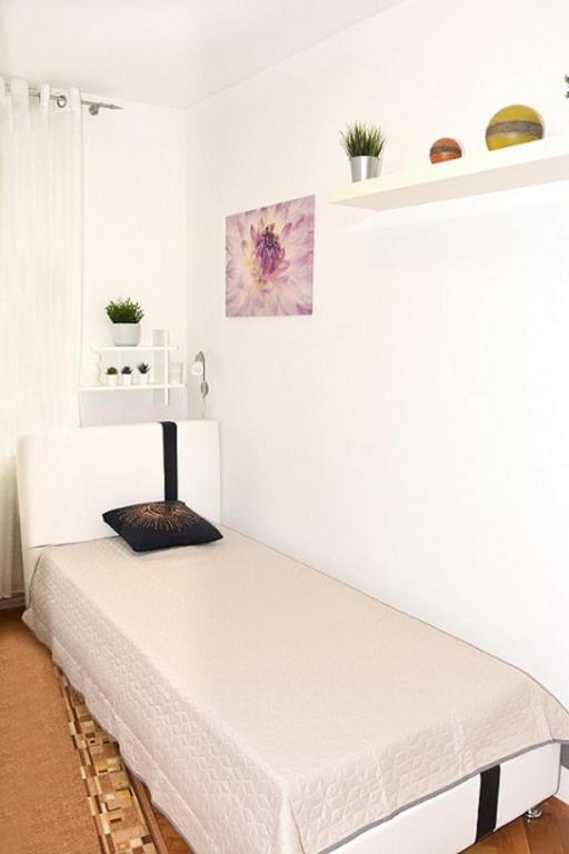 Posteľ alebo postele v izbe v ubytovaní Apartman Vlaška 78