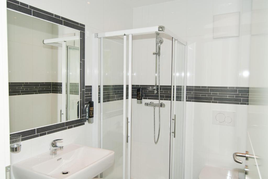 Koupelna v ubytování Hotel Residenz Hössinger