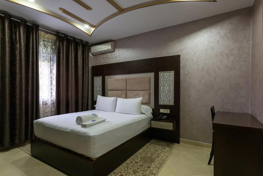 Voodi või voodid majutusasutuse Hotel Jibal Chaouen toas