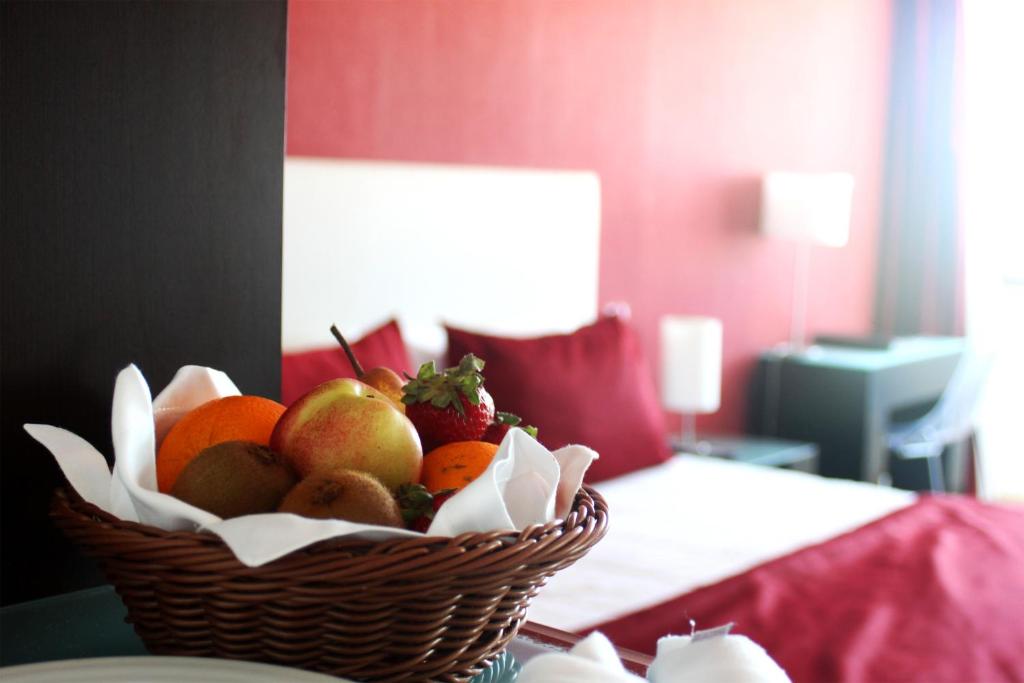 Cama ou camas em um quarto em Miramar Hotel Spa & Apartments