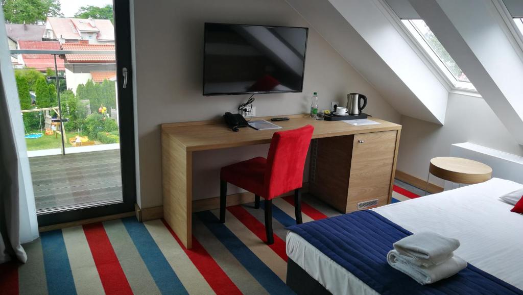Postel nebo postele na pokoji v ubytování Hotel Skipper