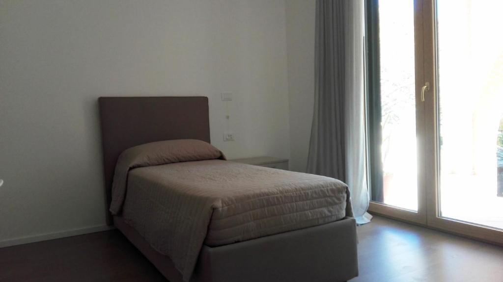 Posteľ alebo postele v izbe v ubytovaní La Casa nel Verde