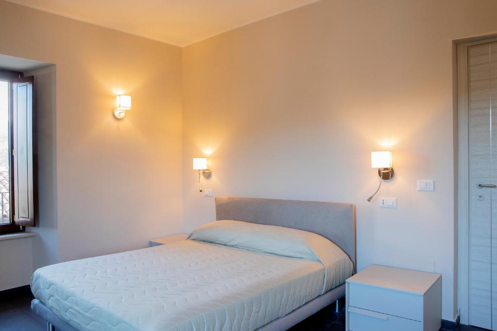 Postel nebo postele na pokoji v ubytování Residenza Cappelli - Affittacamere