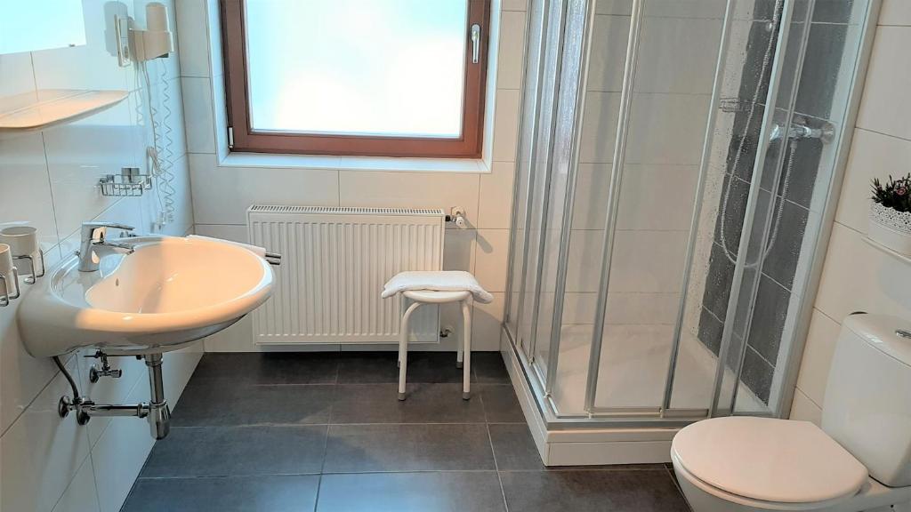 Koupelna v ubytování Hotel Garni Bergland