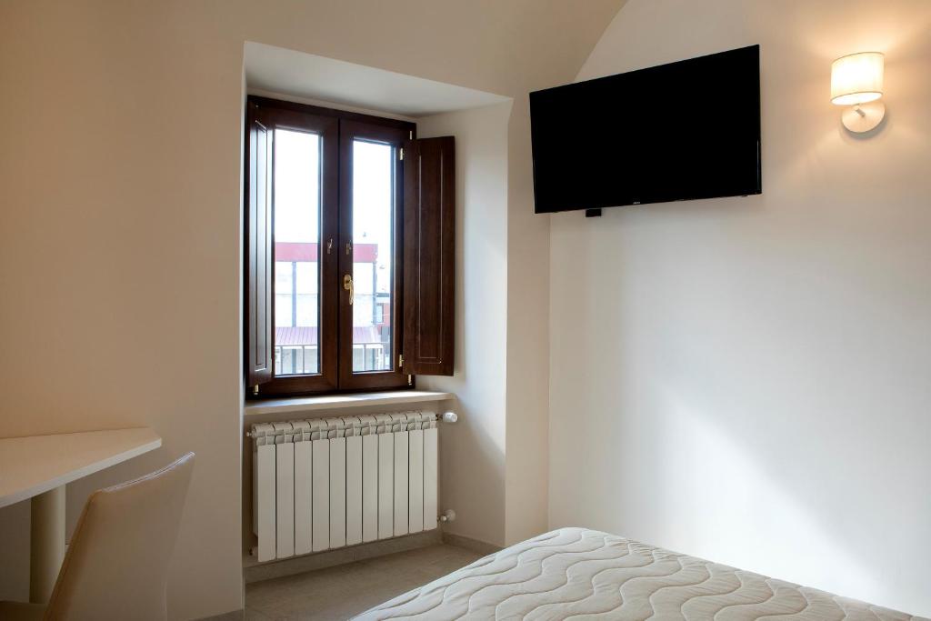 TV a/nebo společenská místnost v ubytování Residenza Cappelli - Affittacamere