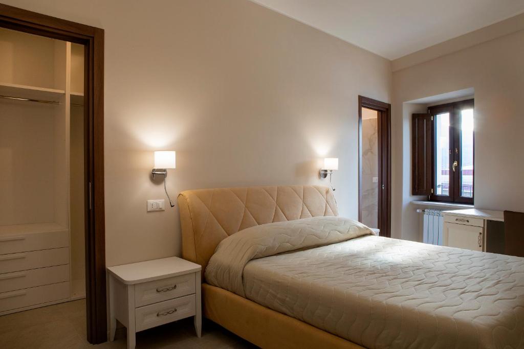 Posteľ alebo postele v izbe v ubytovaní Residenza Cappelli - Case Vacanze