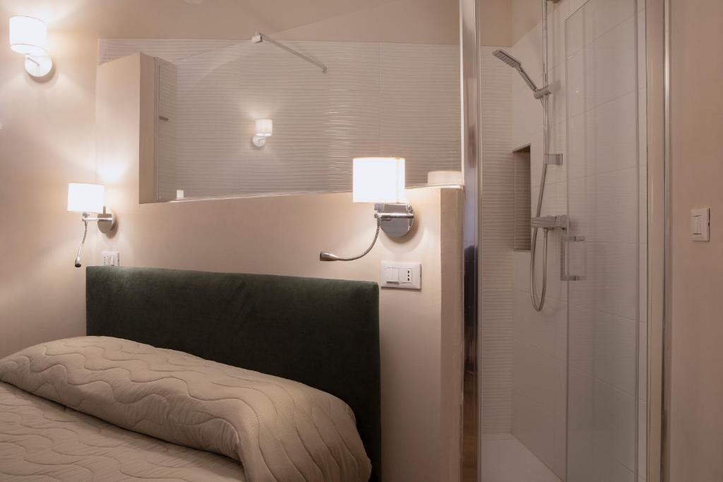Posteľ alebo postele v izbe v ubytovaní Residenza Cappelli - Case Vacanze
