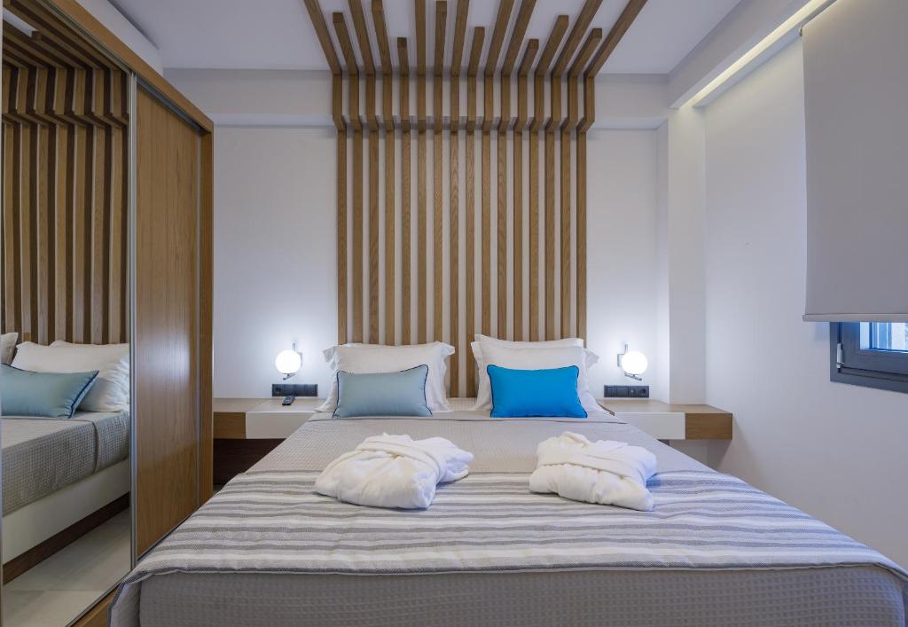 Postel nebo postele na pokoji v ubytování BISALTAE SEASIDE SUITES
