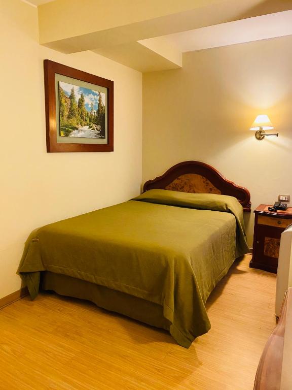 Postelja oz. postelje v sobi nastanitve Hotel Continental Lima