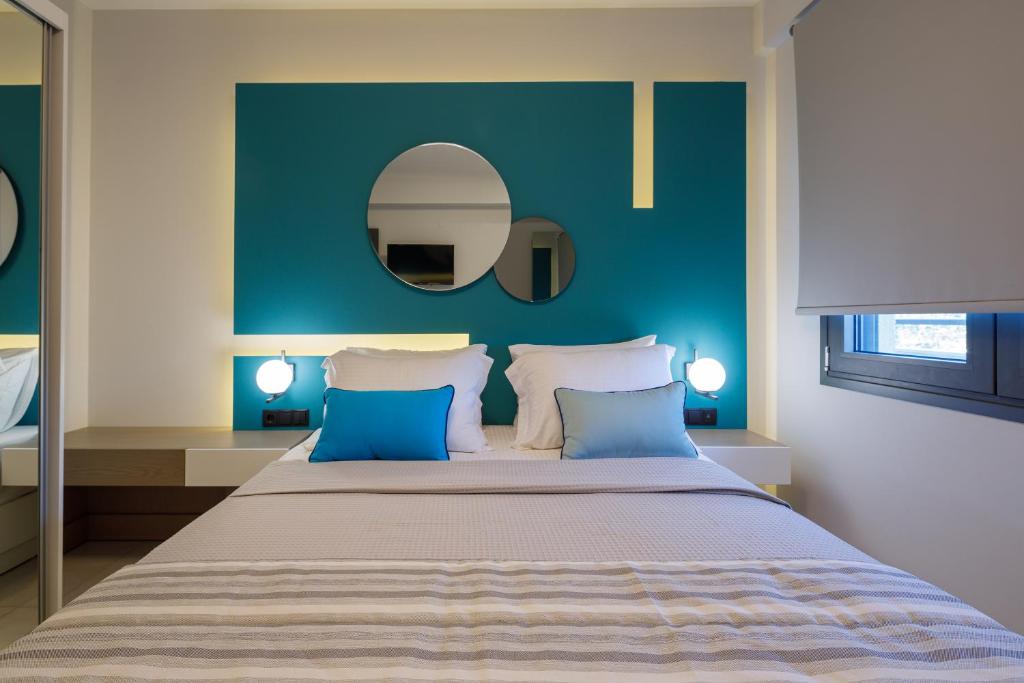 Postel nebo postele na pokoji v ubytování BISALTAE SEASIDE SUITES