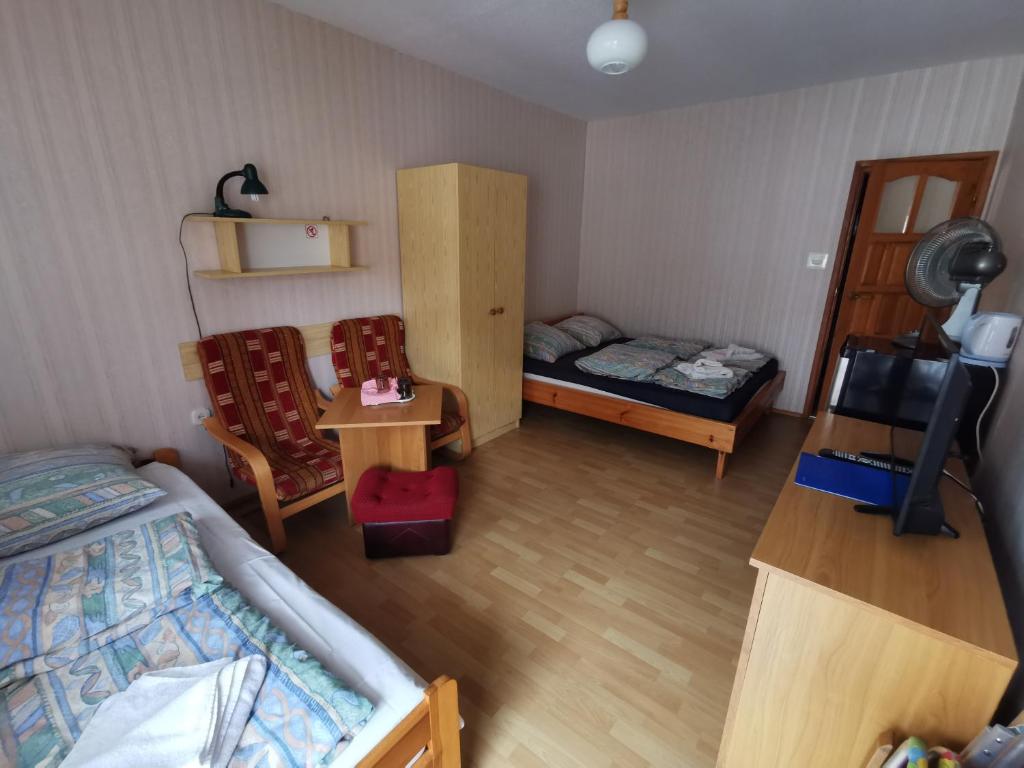 Posteľ alebo postele v izbe v ubytovaní Dom wczasowy Maja