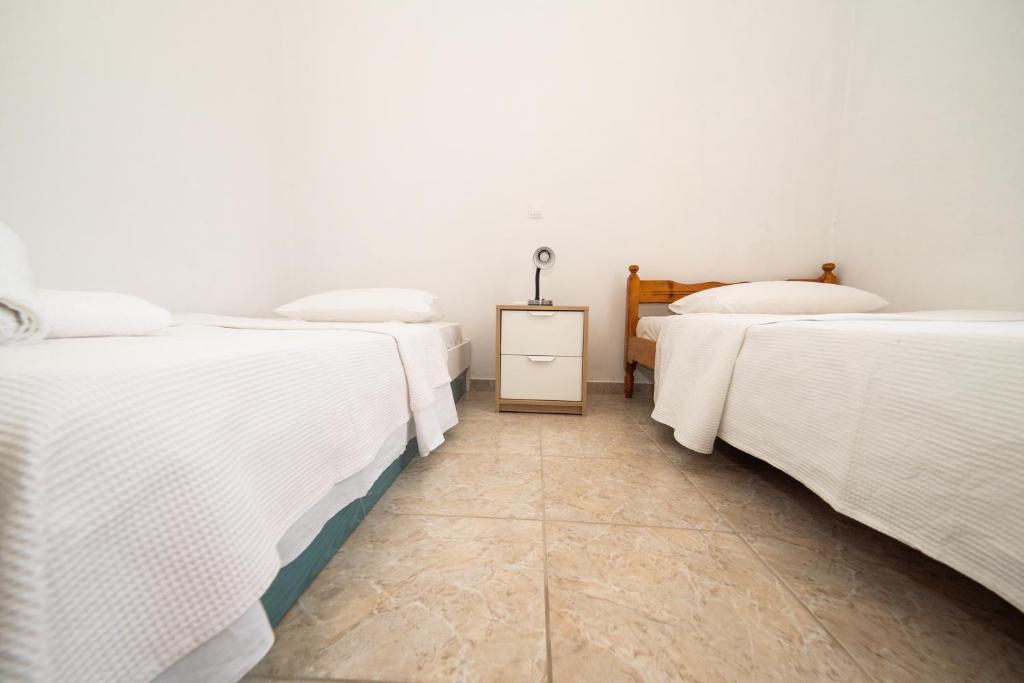 A bed or beds in a room at House by the sea