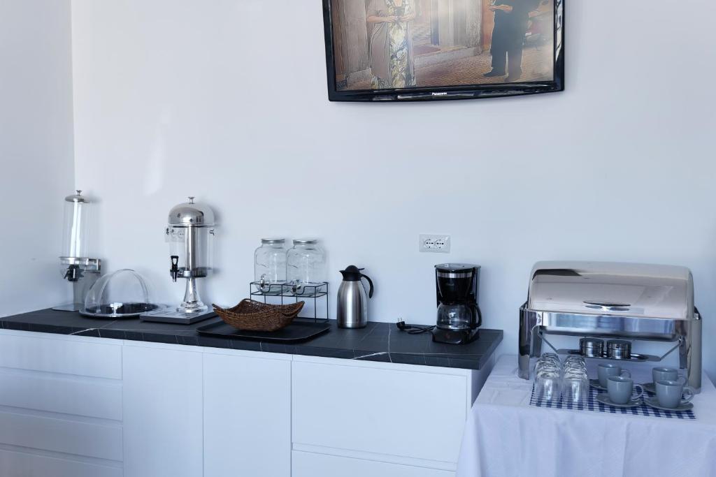 Kuchyň nebo kuchyňský kout v ubytování Lumi Hotel