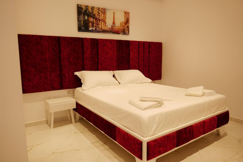 Postel nebo postele na pokoji v ubytování Lumi Hotel