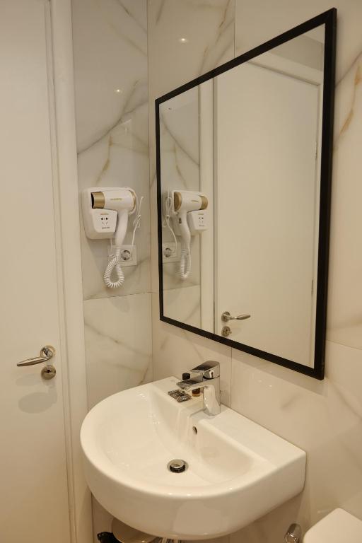 Koupelna v ubytování Lumi Hotel