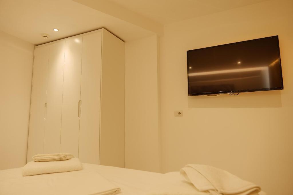 TV a/nebo společenská místnost v ubytování Lumi Hotel