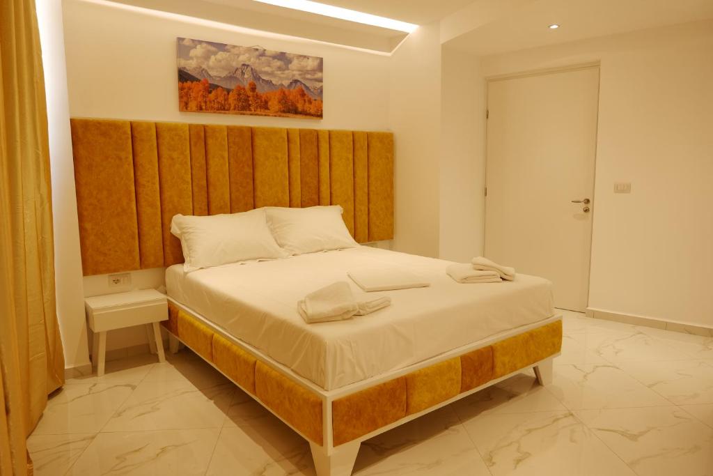 Postel nebo postele na pokoji v ubytování Lumi Hotel