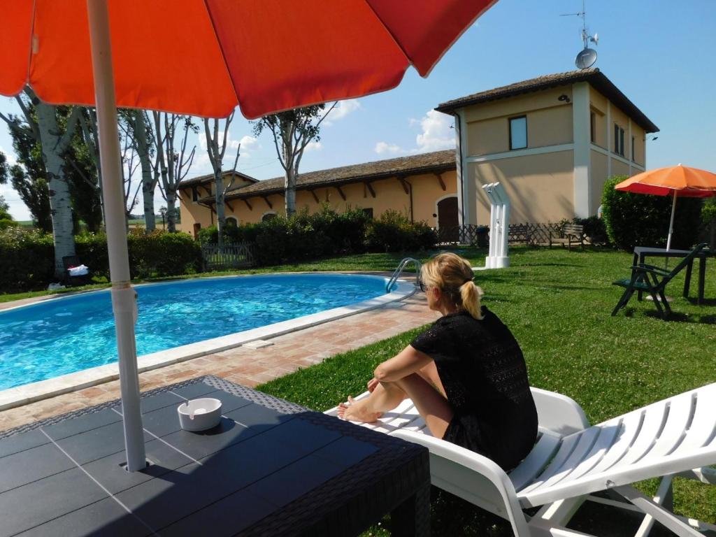 Bazén v ubytování Hotel Villaggio Le Stelline nebo v jeho okolí