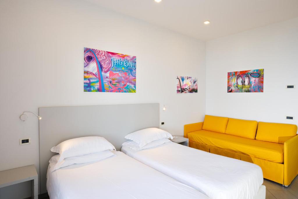 Postel nebo postele na pokoji v ubytování Art Hotel Gran Paradiso