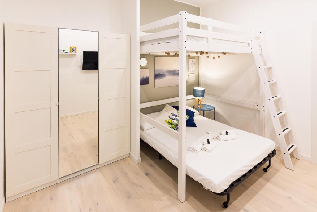 A bed or beds in a room at Apartment Greppi 5