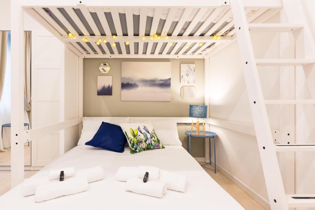 A bed or beds in a room at Apartment Greppi 5