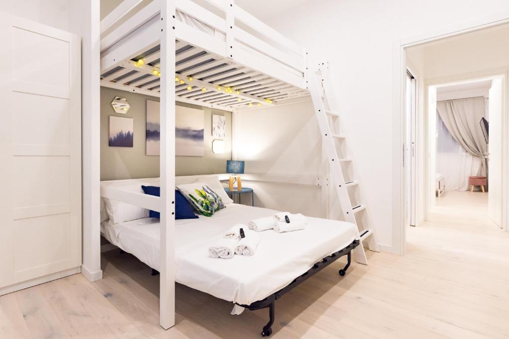 A bed or beds in a room at Apartment Greppi 5