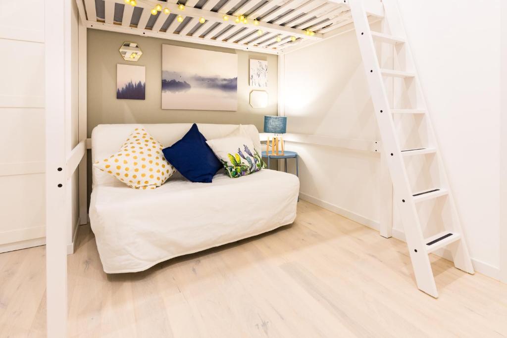 A bed or beds in a room at Apartment Greppi 5