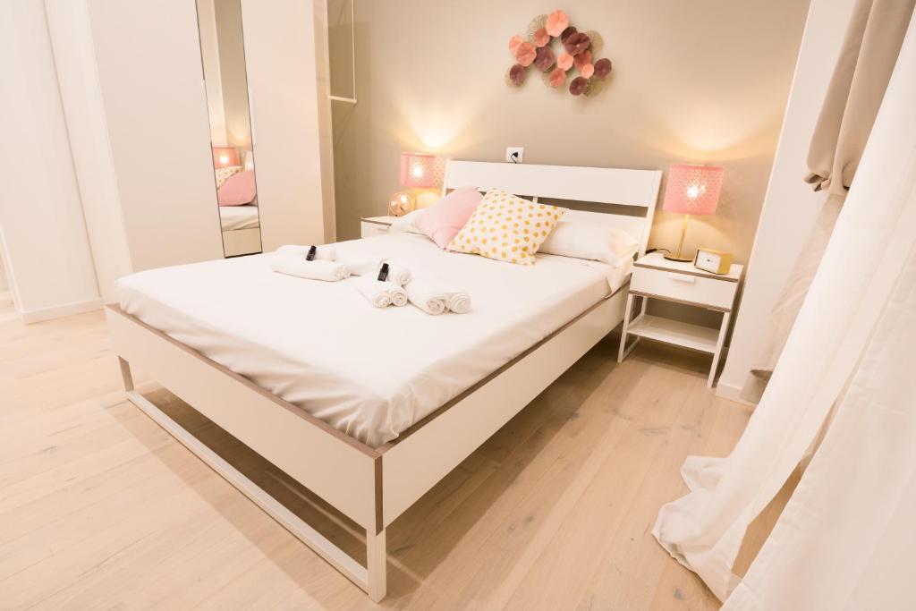 A bed or beds in a room at Apartment Greppi 5
