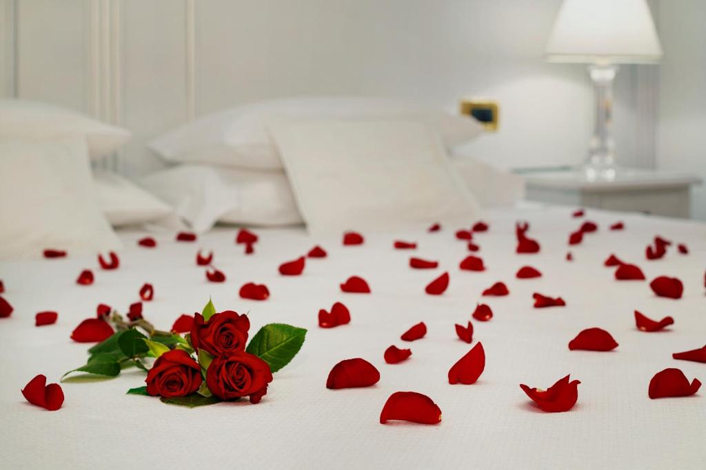 Postel nebo postele na pokoji v ubytování Hotel Al Piave