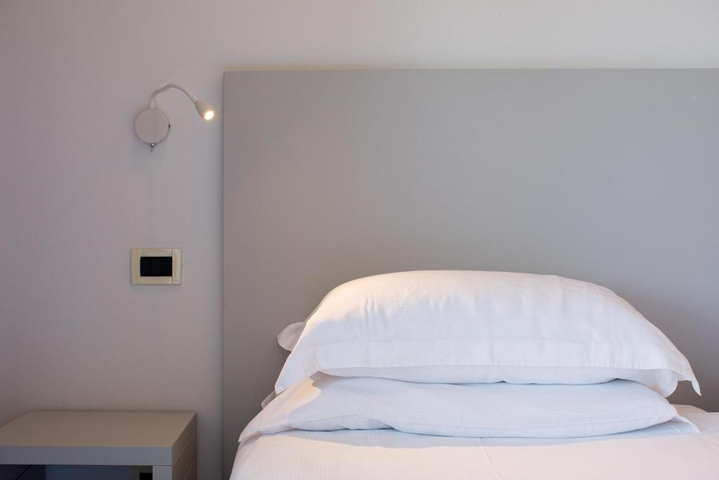 Postel nebo postele na pokoji v ubytování Art Hotel Gran Paradiso