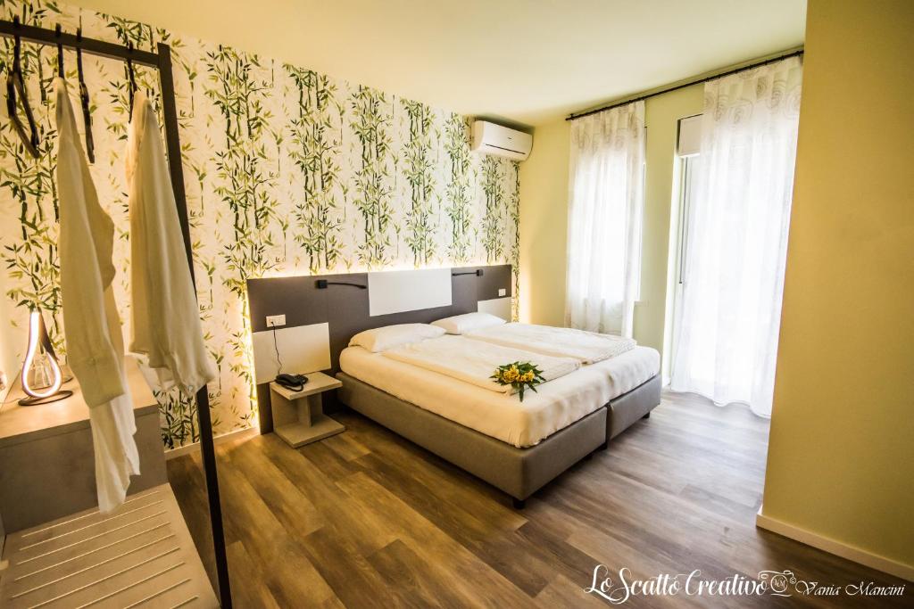 Postel nebo postele na pokoji v ubytování Hotel Eden