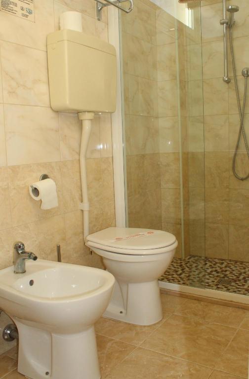 Koupelna v ubytování Hotel Morolli
