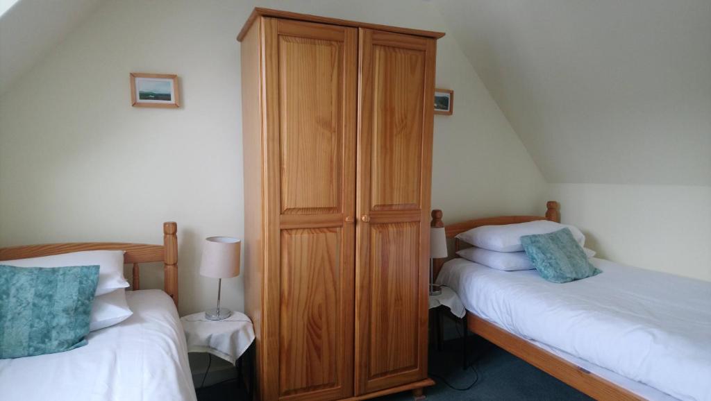 Postel nebo postele na pokoji v ubytování Auld Cross Keys Inn