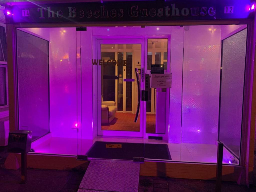 a room with purple lights on the front of a building at The Beeches in Clacton-on-Sea