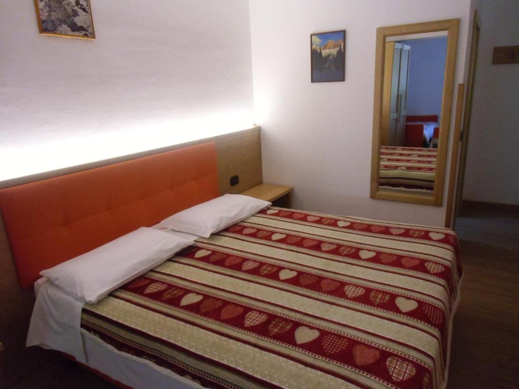 Postel nebo postele na pokoji v ubytování Garni Festil