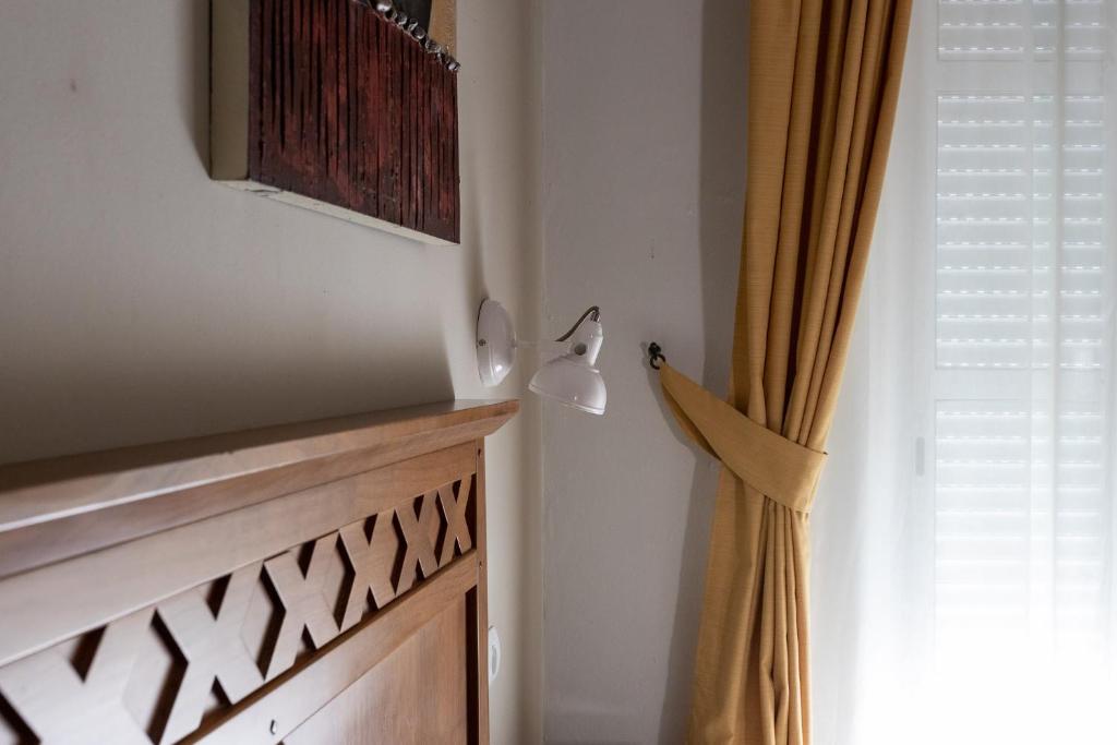 Postel nebo postele na pokoji v ubytování Hostal Costa Luz