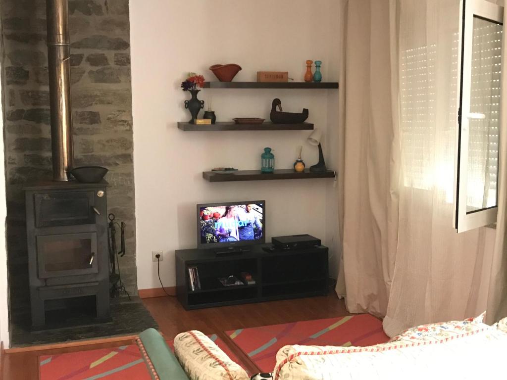TV a/nebo společenská místnost v ubytování Casas Botelho Elias